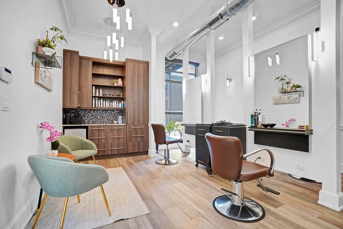 Bright hair salon with high ceilings and natural light