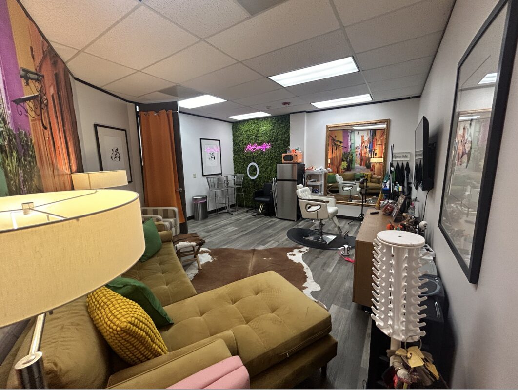 Beauty suite with brick wall and ring light